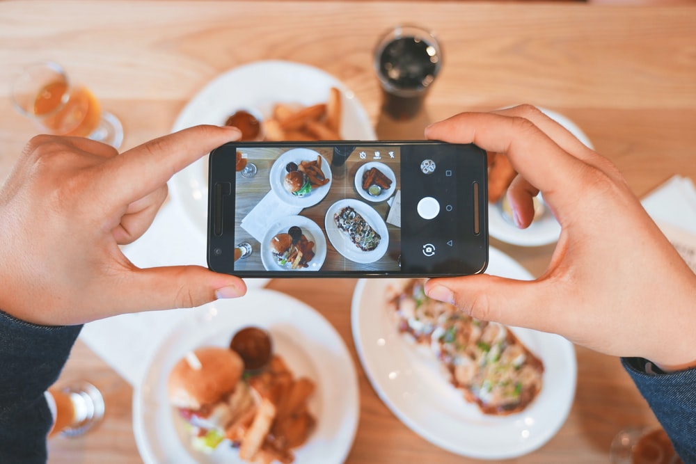 person-taking-a-photo-of-their-food.jpeg