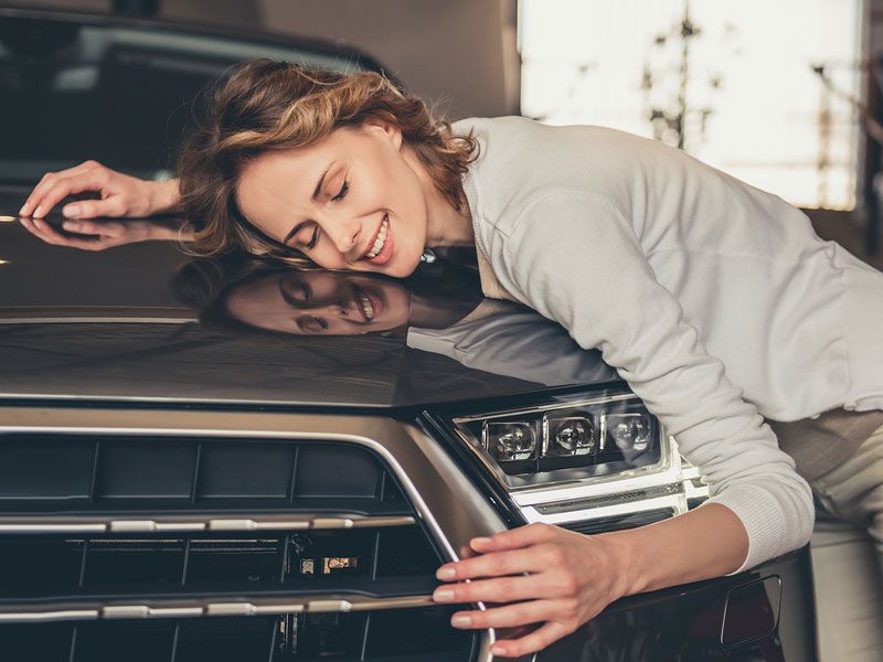 bigstock woman hugging car 