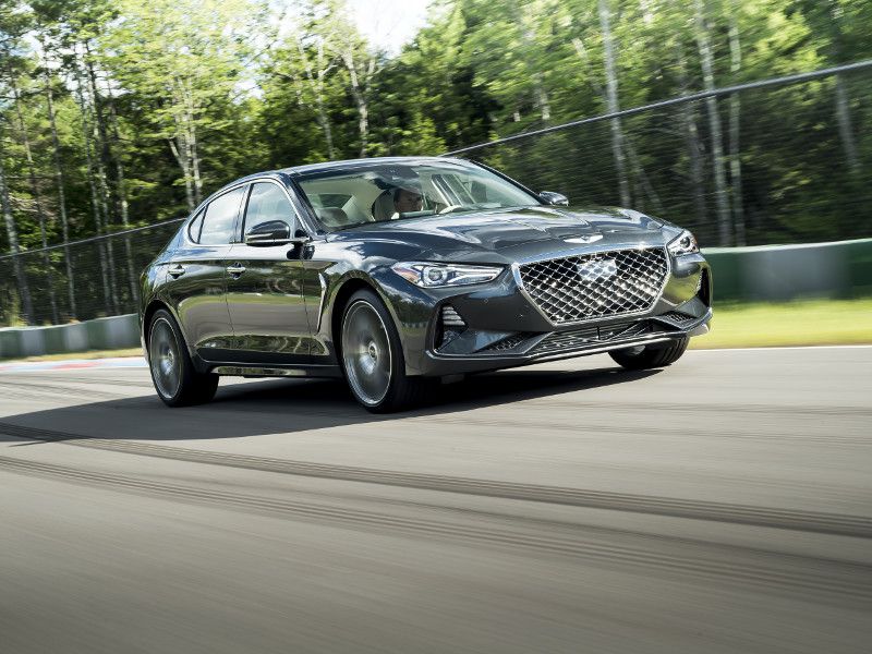 2019 Genesis G70 grey driving ・  Photo by Genesis