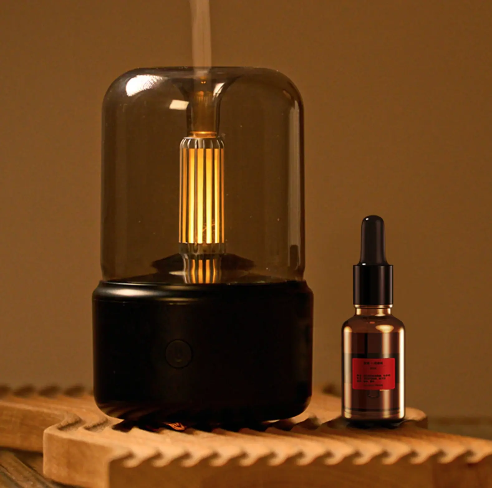 sleek black diffuser with ambient light in the middle