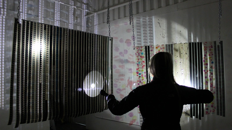TBA:14 Jennifer West FLASHLIGHT FILMSTRIP PROJECTIONS