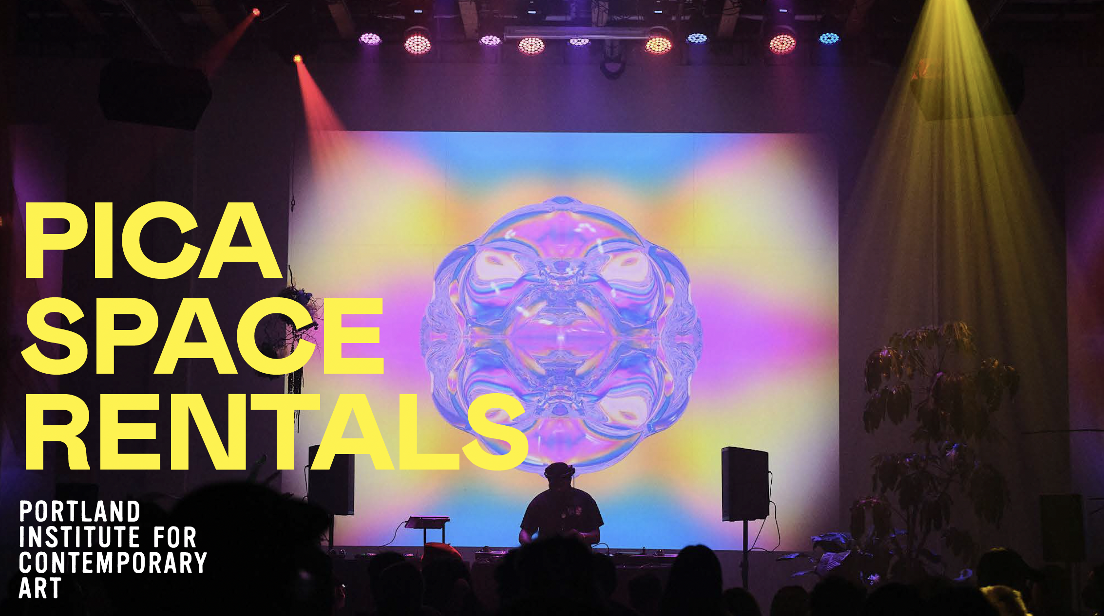 Photo of a large party with a DJ on a stage in PICA's main warehouse space. Yellow text overlay reads 