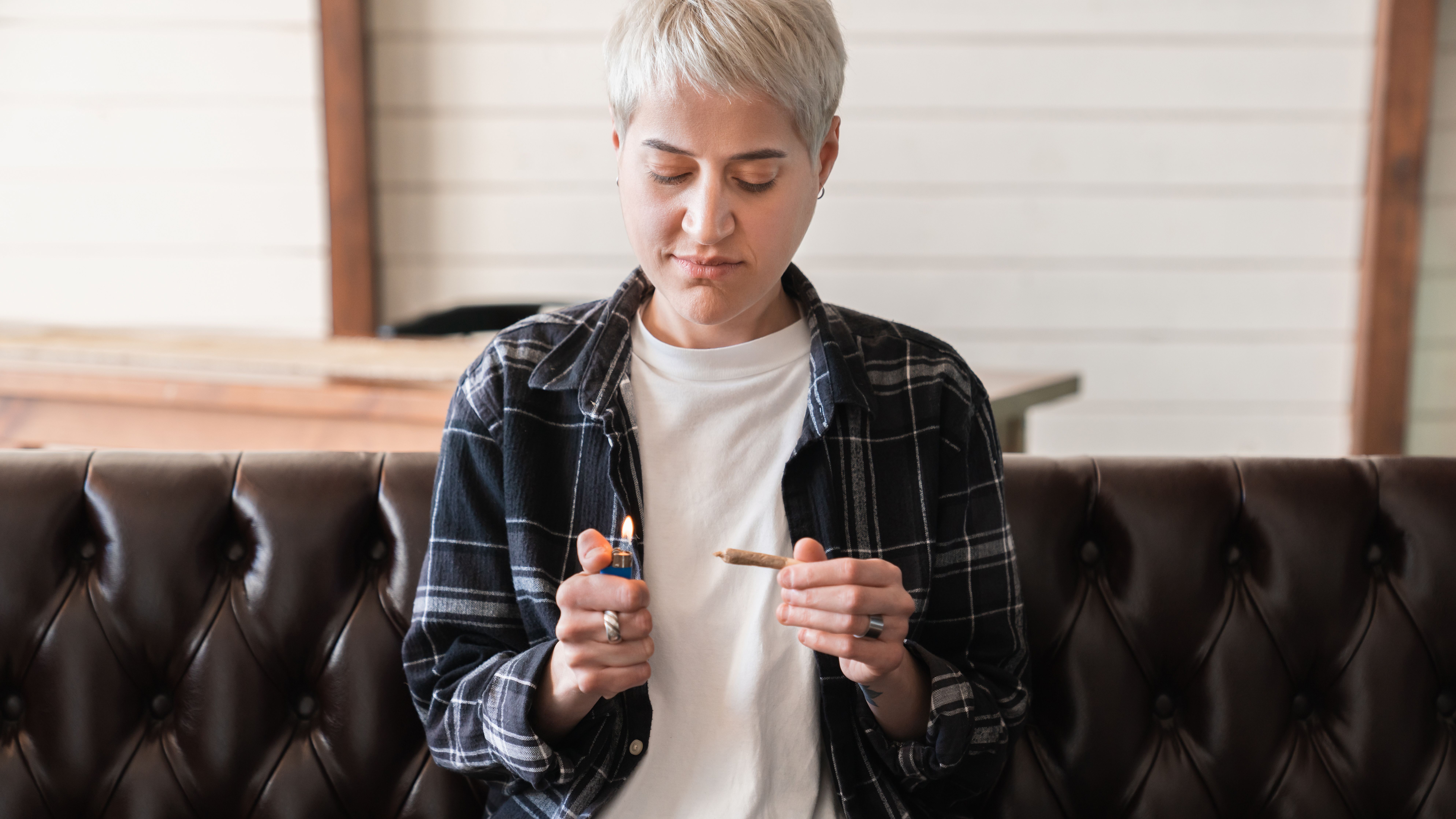 young-hipster-woman-girl-lighting-up-marijuana-can-2025-01-09-04-27-19-utc.jpg