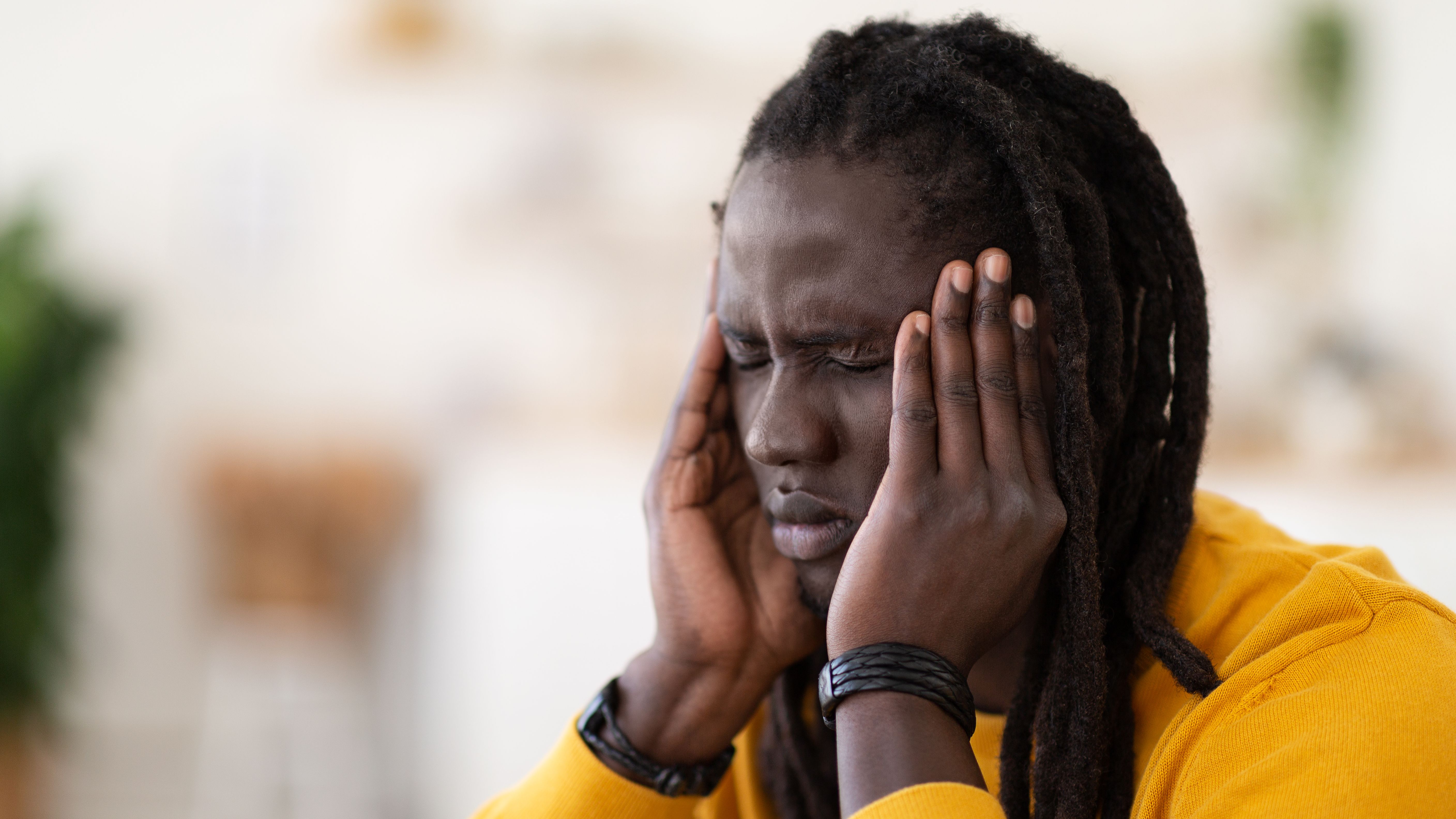 closeup-shot-of-stressed-black-young-man-suffering-2025-03-18-18-24-21-utc.jpg