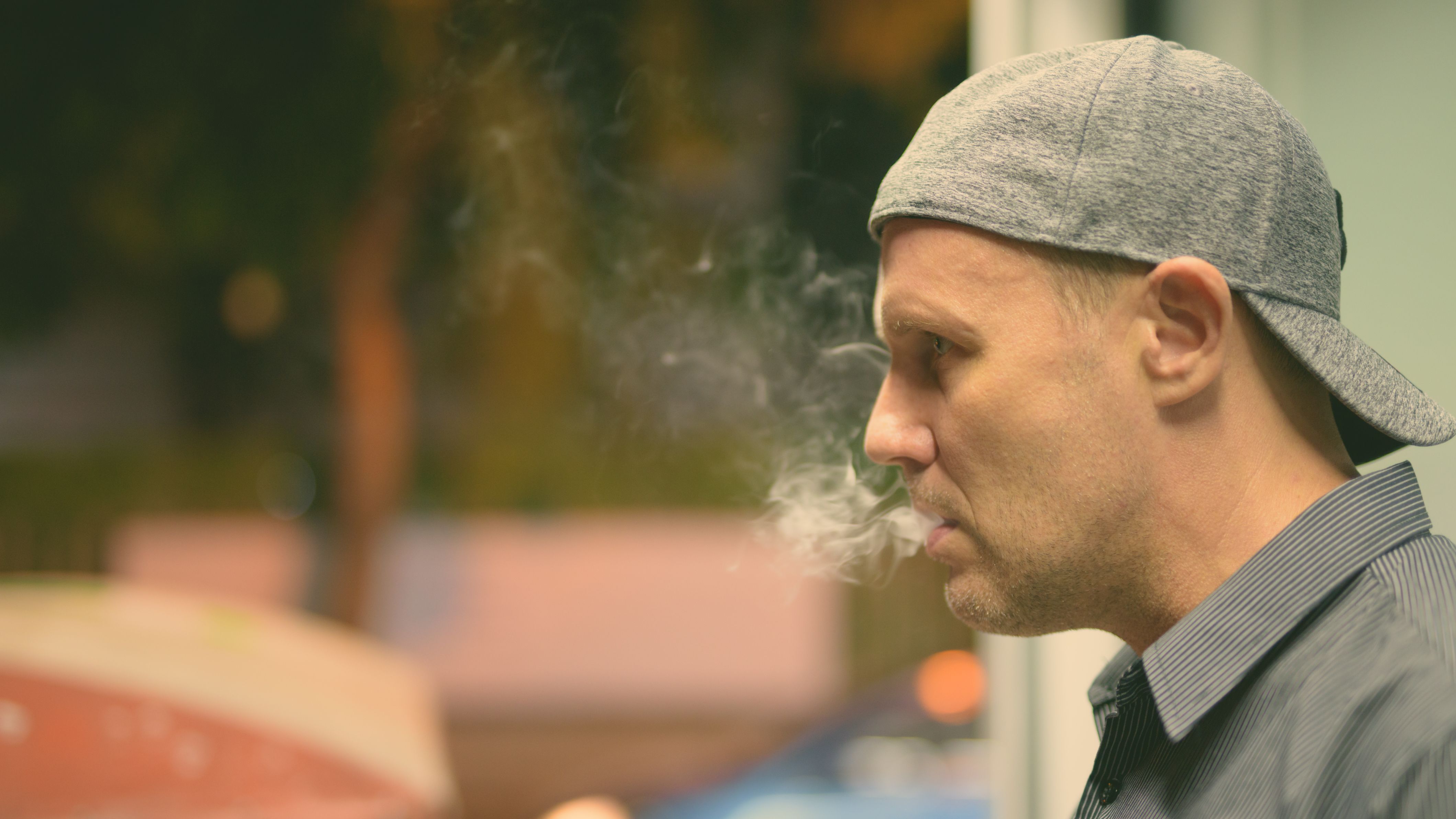 mature-man-smoking-electronic-cigarette-in-the-str-2025-01-29-02-58-09-utc.jpg