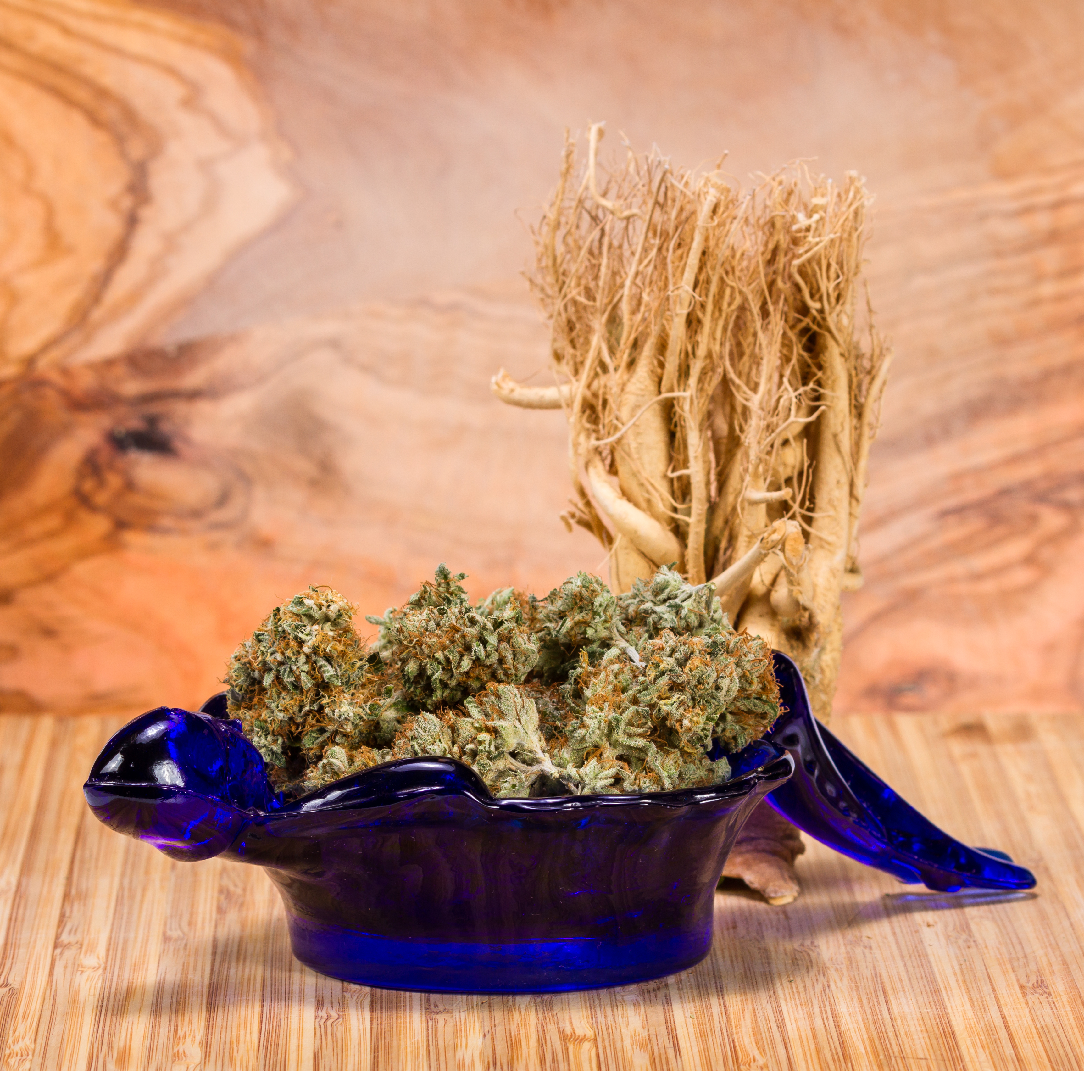 cannabis-in-a-decorative-blue-glass-bowl-with-a-ro-2025-10-28-21-38-38-utc.jpg