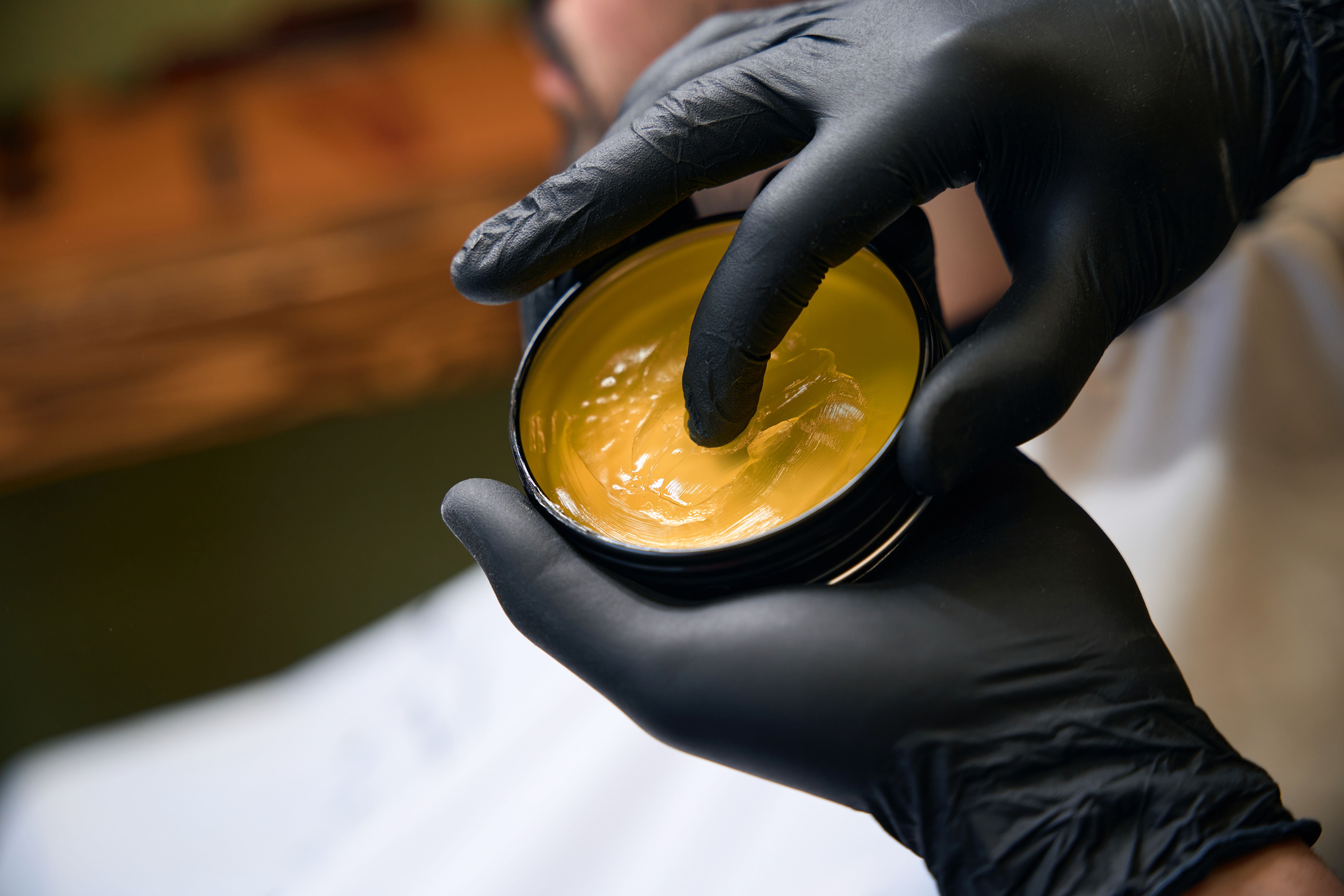 cannabis-wax-in-black-gloves-using-2025-03-10-01-05-05-utc.jpg