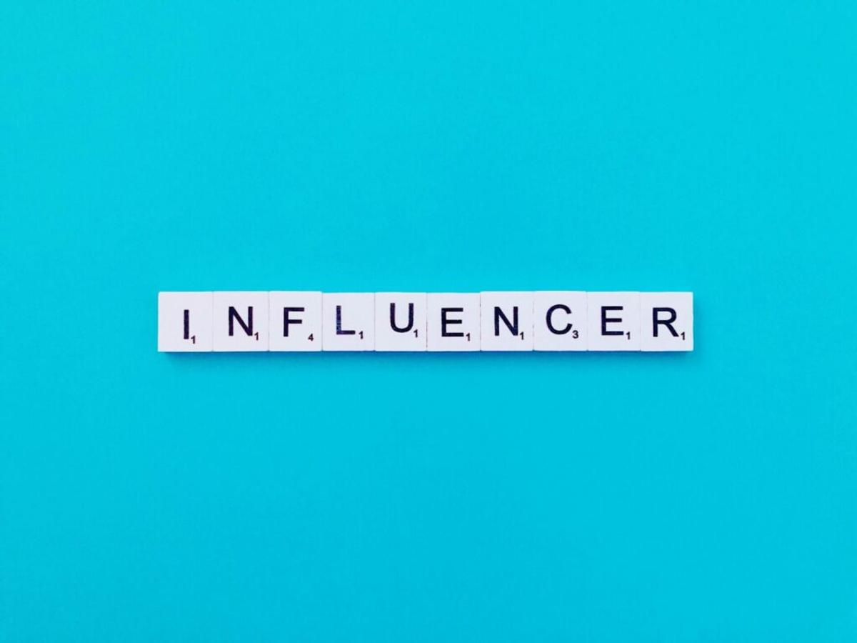scrabble pieces spelling Influencer