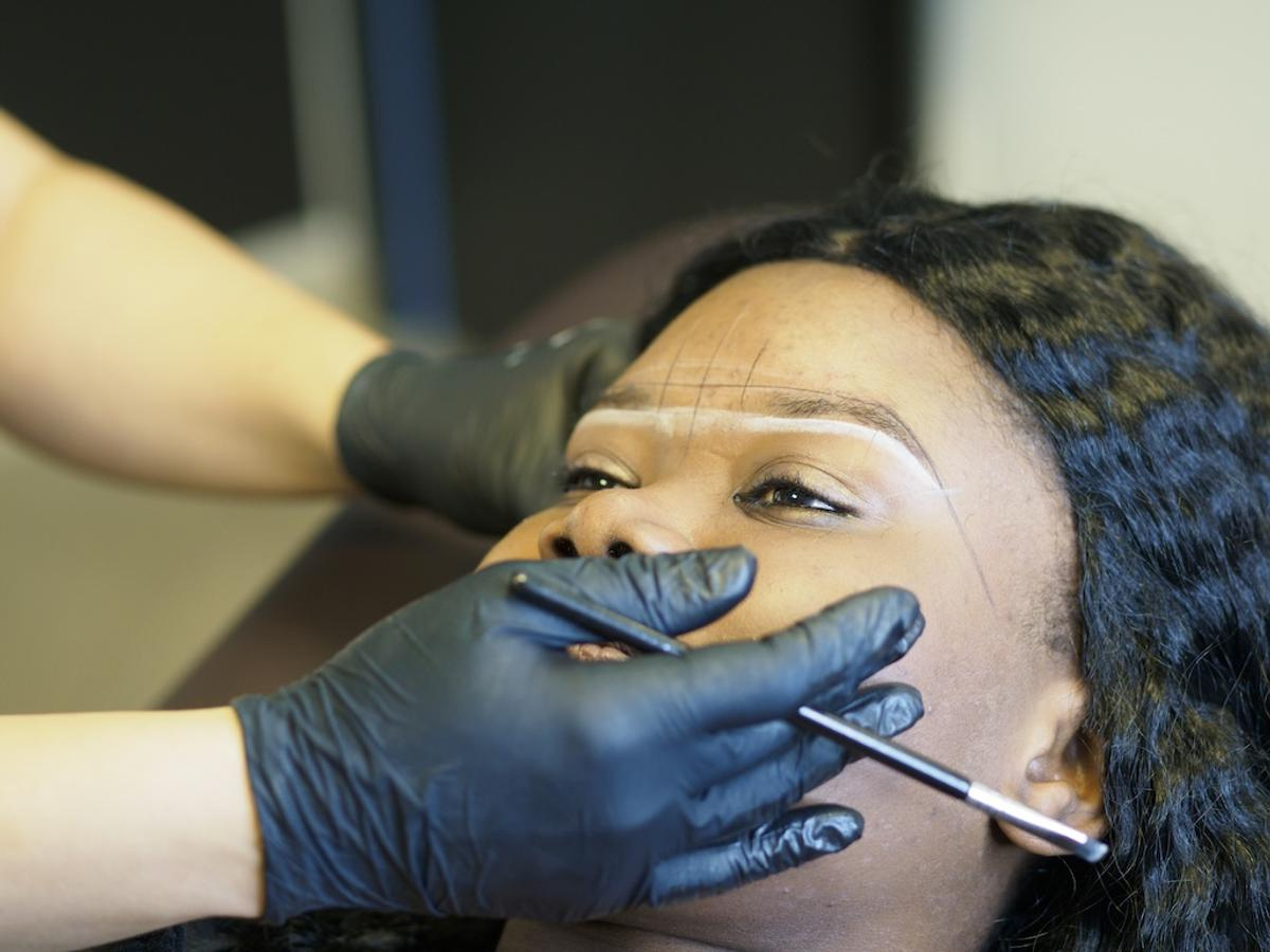 beautician-preparing-eyebrow-with-white-marker-bef-2025-02-20-01-10-07-utc.jpg