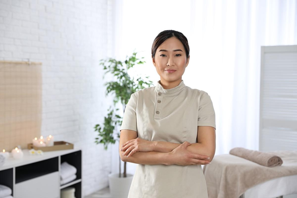 portrait-of-young-asian-masseuse-in-spa-salon-2026-03-12-21-34-19-utc.jpg