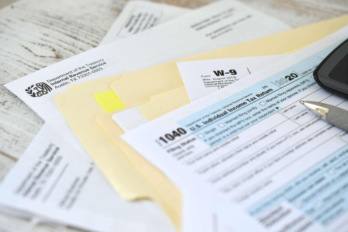 tax-forms-and-calculator-on-desk-surface-2026-03-24-07-07-09-utc (1).jpg