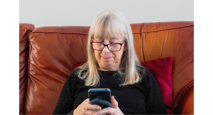 woman-senior-telehealth-phone-wide-crop .png