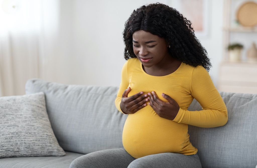 A woman experiencing nipple discomfort
