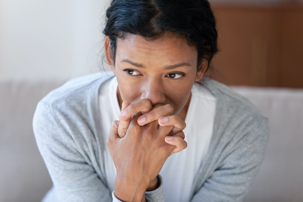 A woman who looks anxious or worried