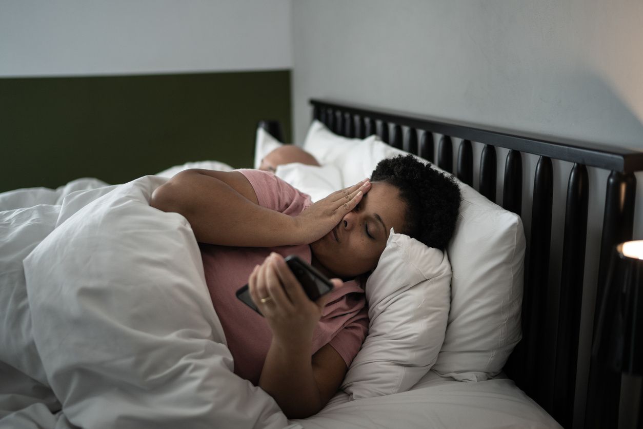 Woman searches HealthTap's free Doctor Q&A for information about insomnia