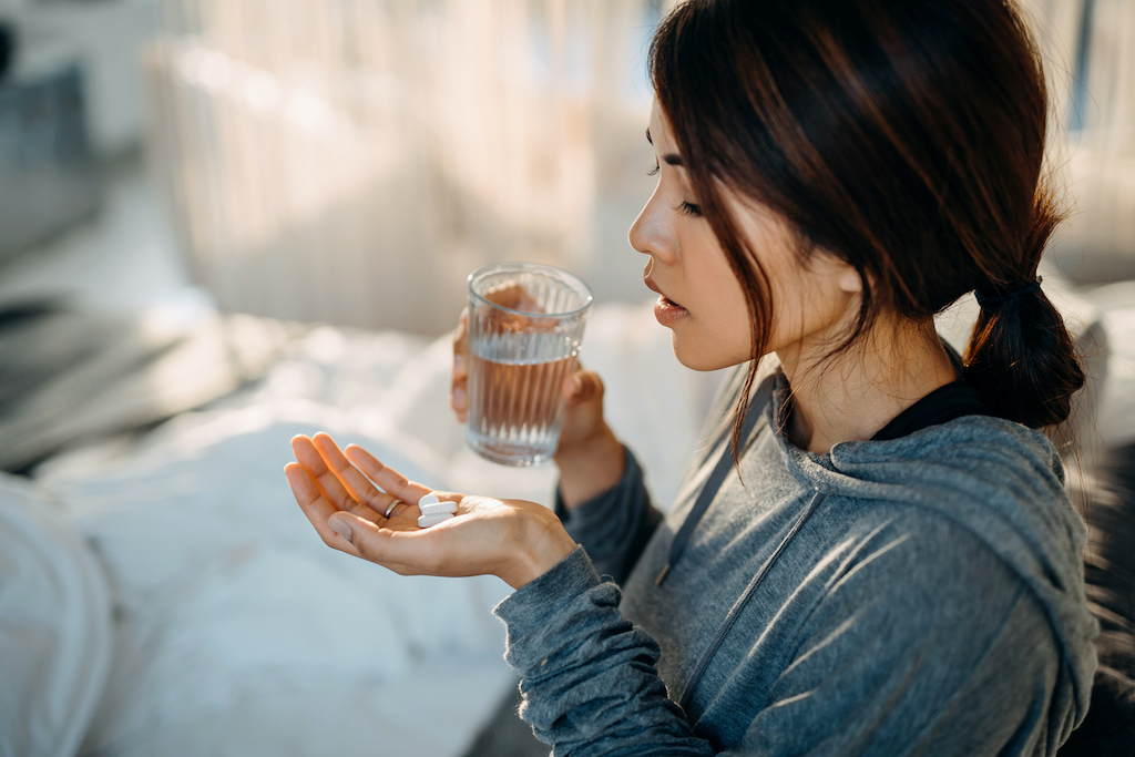 woman_taking_antibiotics_1024x683.jpg