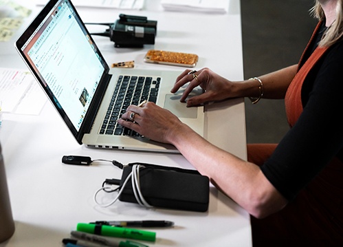 production coordinator accesses documents on film set using digital solutions