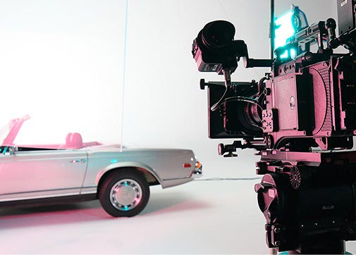 car on film set camera convertible