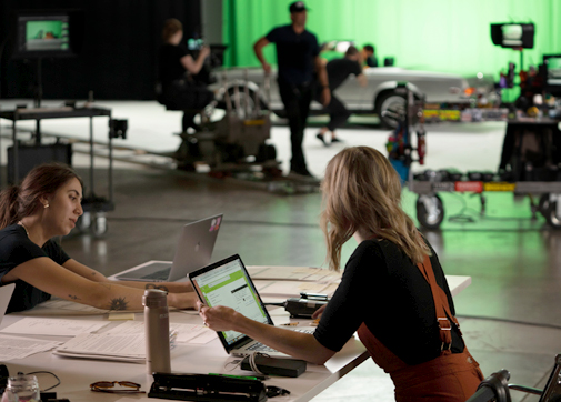 Production workers on set using AssetHub
