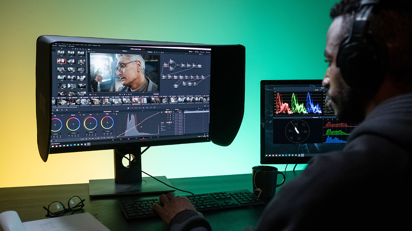 Post-Production-Tax-Credits-Editor working on a professional film editing suite.jpg
