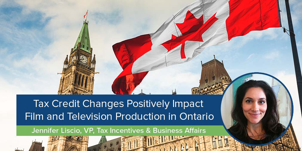 Canadian flag waving over Parliament tax credit changes in Ontario