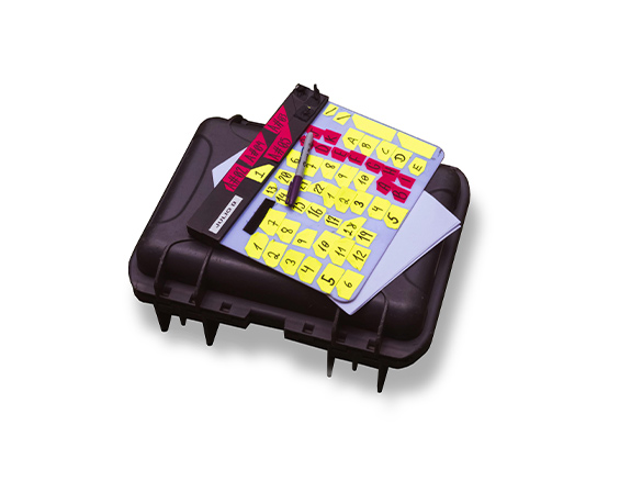 Clapboard with shot list number labels on back