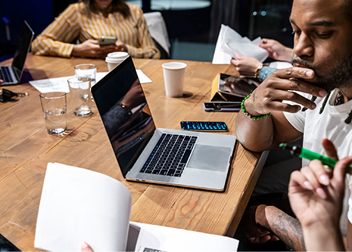 Evening company team meeting in conference room