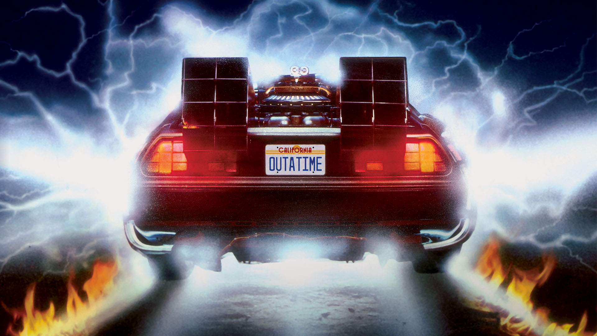 The rear of the DMC DeLorean with a California license plate that reads OUTATIME.