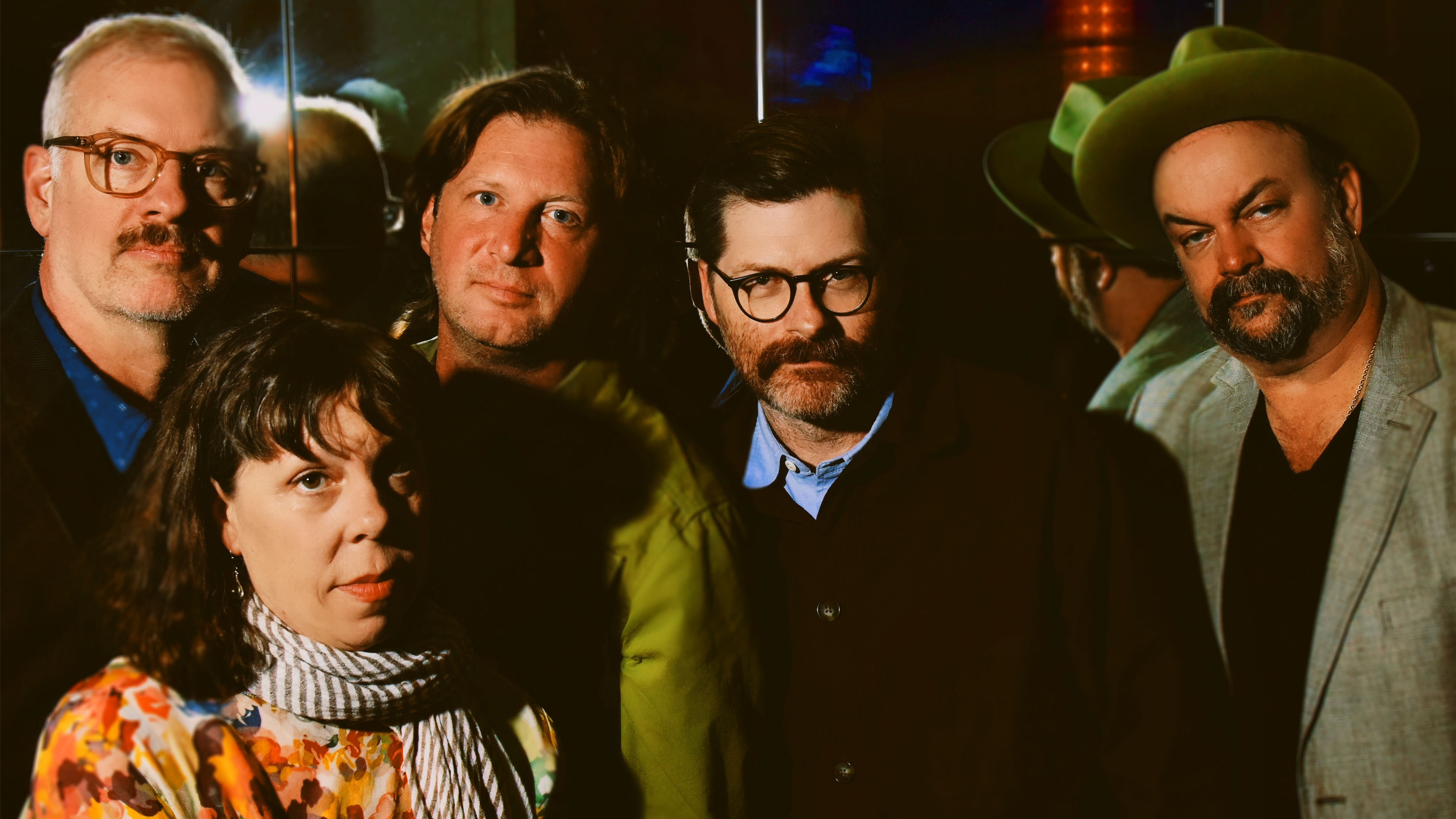 The members of The Decemberists posing together. 