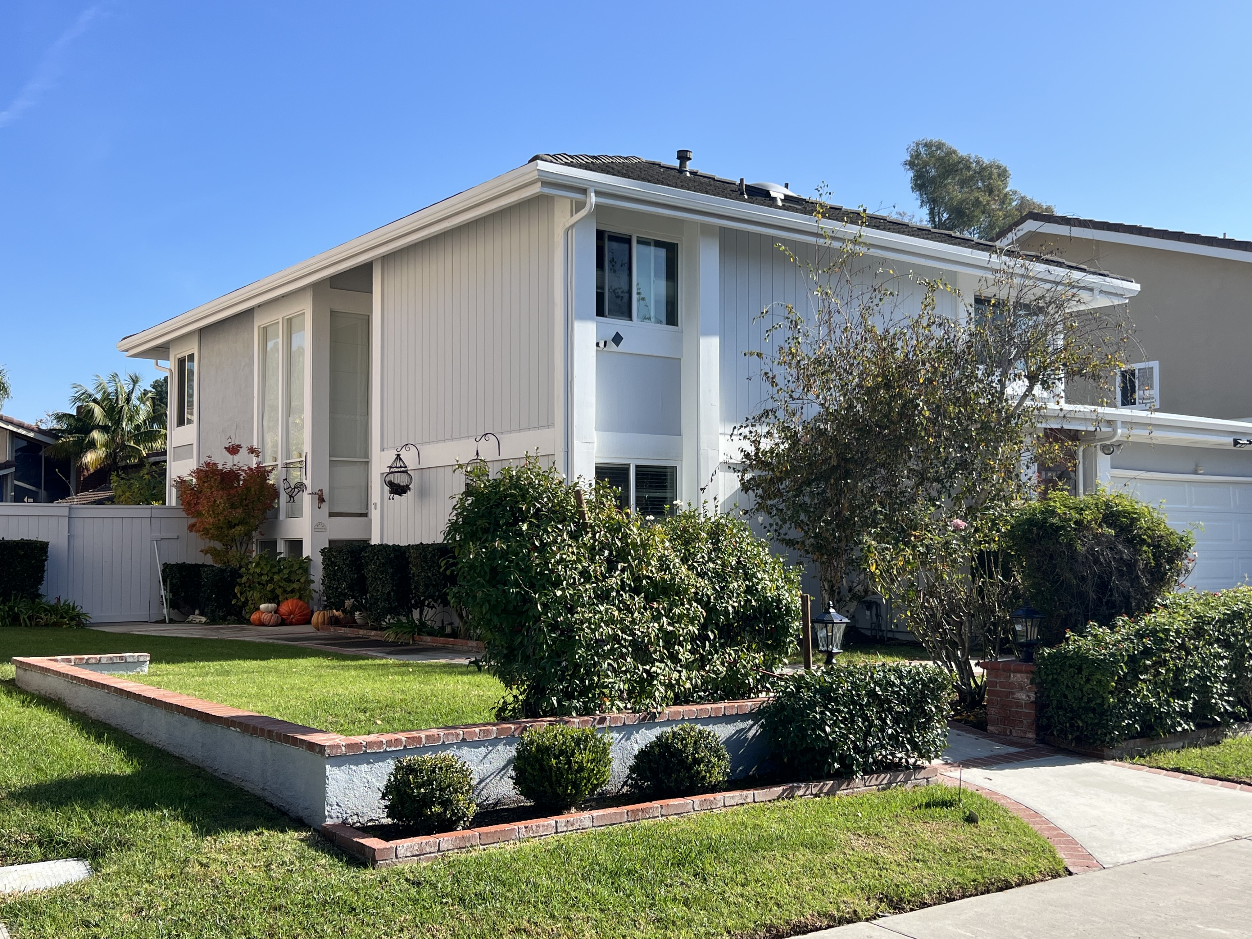 SINGLE FAMILY 3 BATHROOMS 4 BEDROOMS. Property has not been updated to today's standard but in good and livable condition. New exterior and interior paint. Welcome to 17682 Cassia Tree Lane, a long-awaited single-family residence offering over 2,200 square feet of living space, soon to be available in the highly desirable University Park community. Tucked away in a quiet neighborhood, this home is just a short walk to the Parkside HOA amenities, including a swimming pool, spa, tennis courts, clubhouse, and a beautifully maintained park. Step into the inviting living room featuring soaring ceilings, abundant natural light, a cozy fireplace, and wood flooring, creating a bright and spacious atmosphere. Adjacent to the living room is a dedicated dining area, ideally situated by the patio window—perfect for both everyday meals and entertaining. The main level also offers a bedroom and a full bathroom with an enclosed shower.