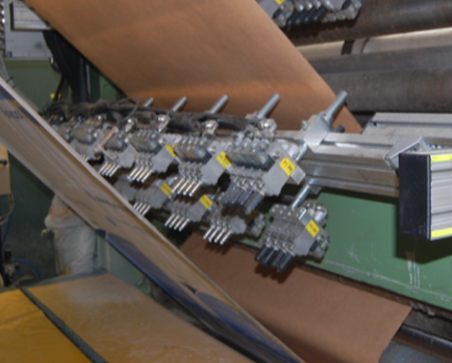 Cross Pasting Non-Contact Glue System on Tuber 