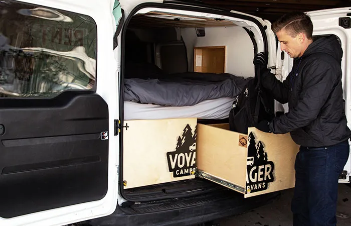 Every-Voyager-Campervan-also-includes-a-pull-out-storage-compartment..jpg.webp