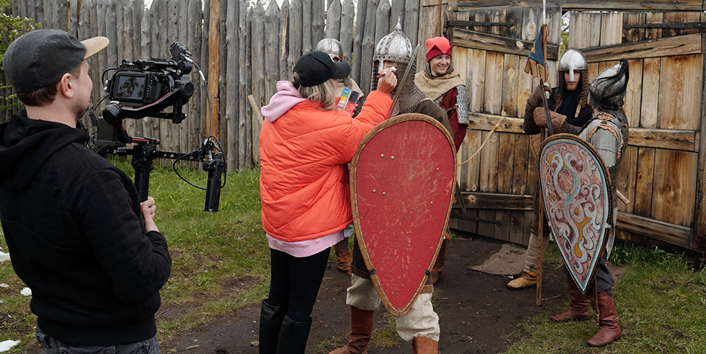 Crew and actors on a film set