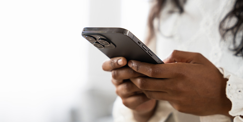 A woman holding a cell phone