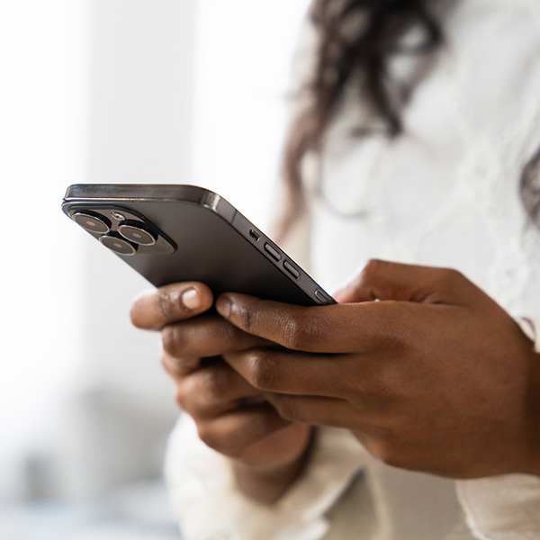 A woman holding a cell phone