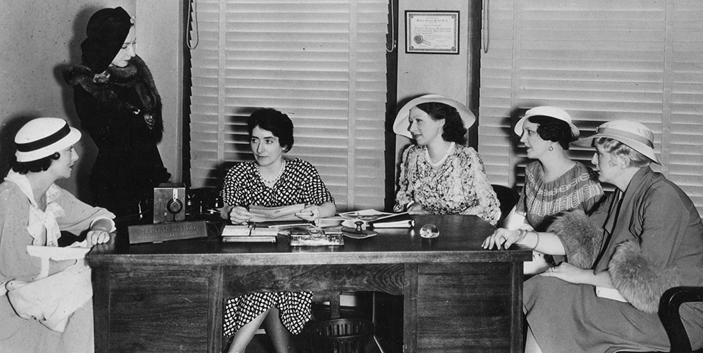 Casting director Marian L. Mel interviewing background actors