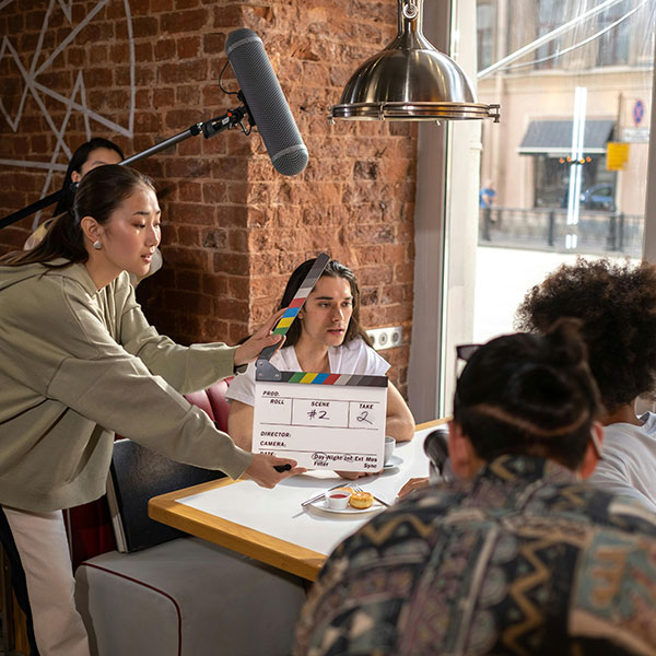 Actors on a film set following the top acting tip for beginners of not looking at the camera