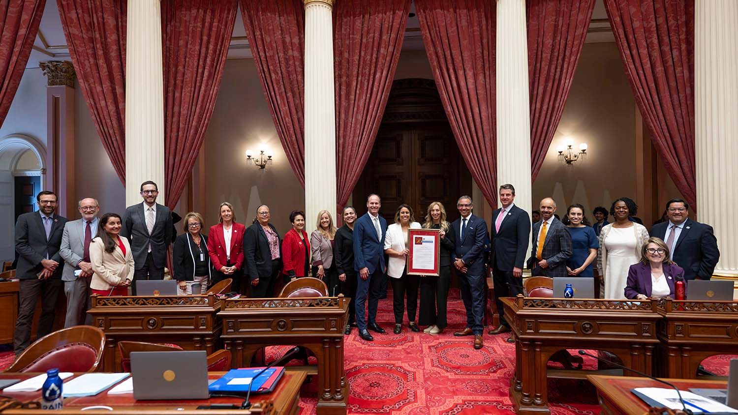 Mark Goldstein, Darren Seidel, and Jennifer Bender join Senator Caroline Menjivar in Sacramento for the resolution presentation honoring Central Casting.