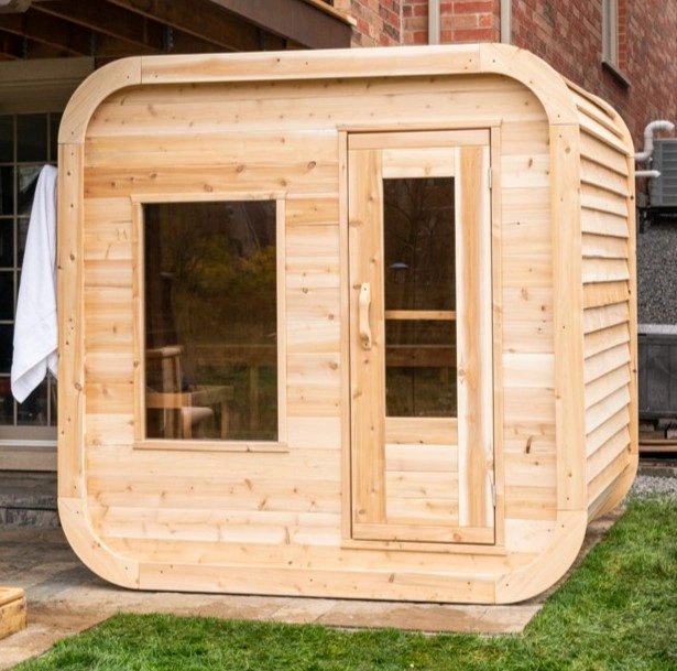 LeisureCraft Luna sauna in eastern white cedar showing lighter creamy tones, the same model in a different Canadian wood