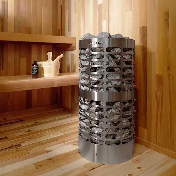 Homecraft electric sauna heater with stacked stones in the corner of a cedar sauna