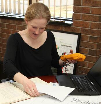 Sensor installation in industrial fluid control setup.