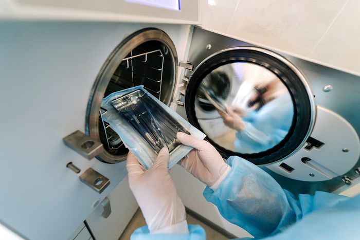 bigstock-Female-Nurse-Doing-Sterilizati-360566149.jpg