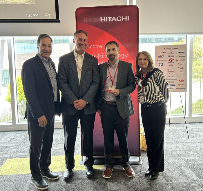 Qualitrol team accepting Sustainability Excellence Award from Hitachi Energy at awards ceremony