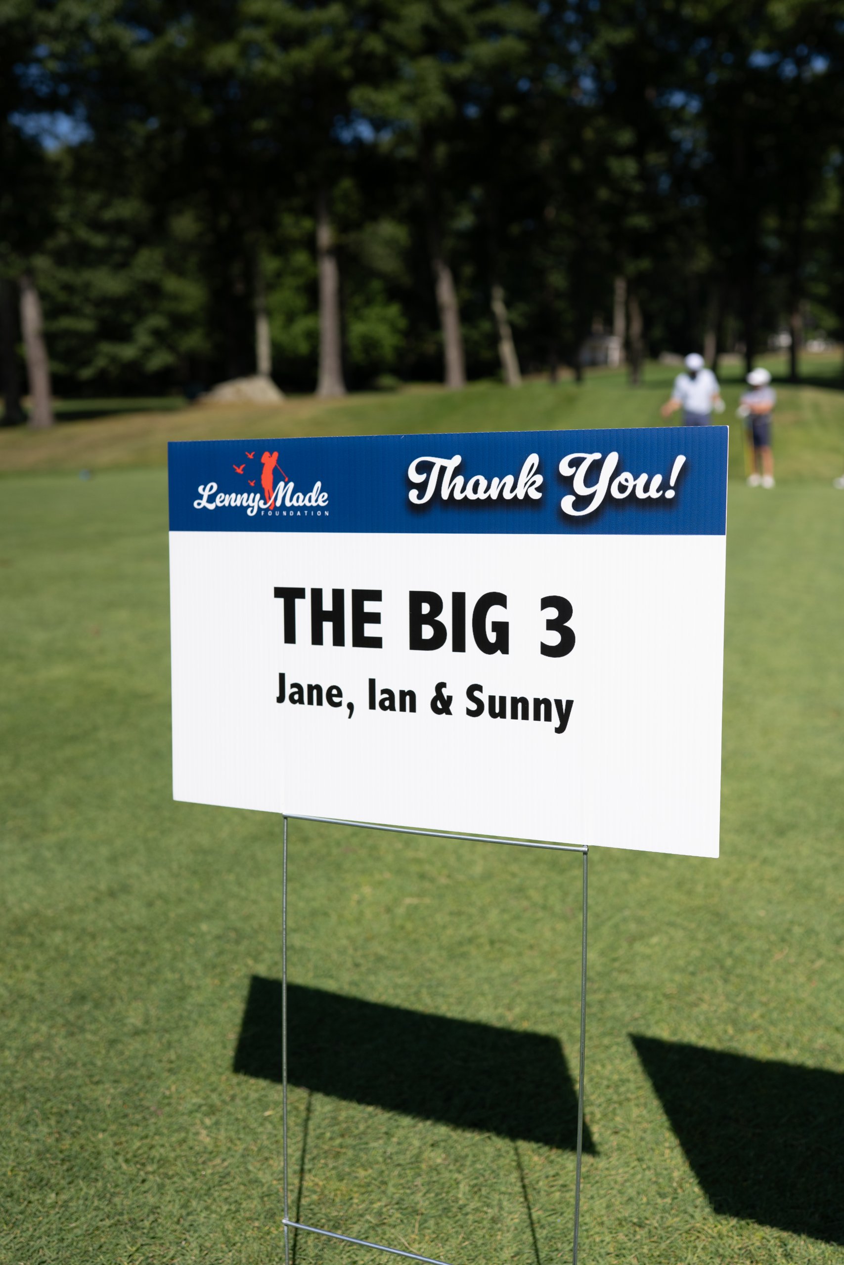 Close-up of the LennyMade Foundation Thank You sponsor sign for The Big 3, Jane, Ian and Sunny.