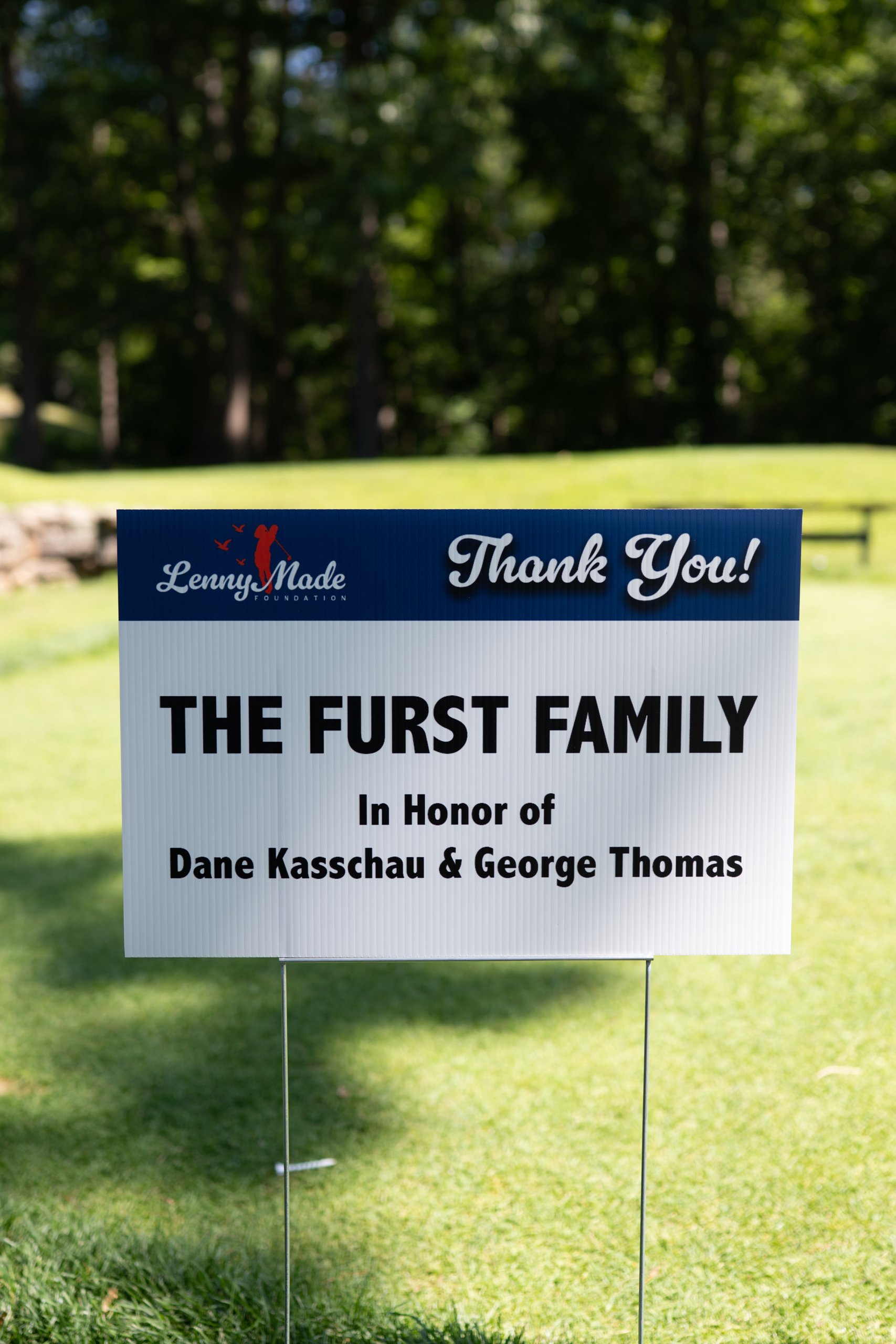 A LennyMade Foundation Thank You sponsor sign for The Furst Family, in honor of Dane Kasschau and George Thomas.