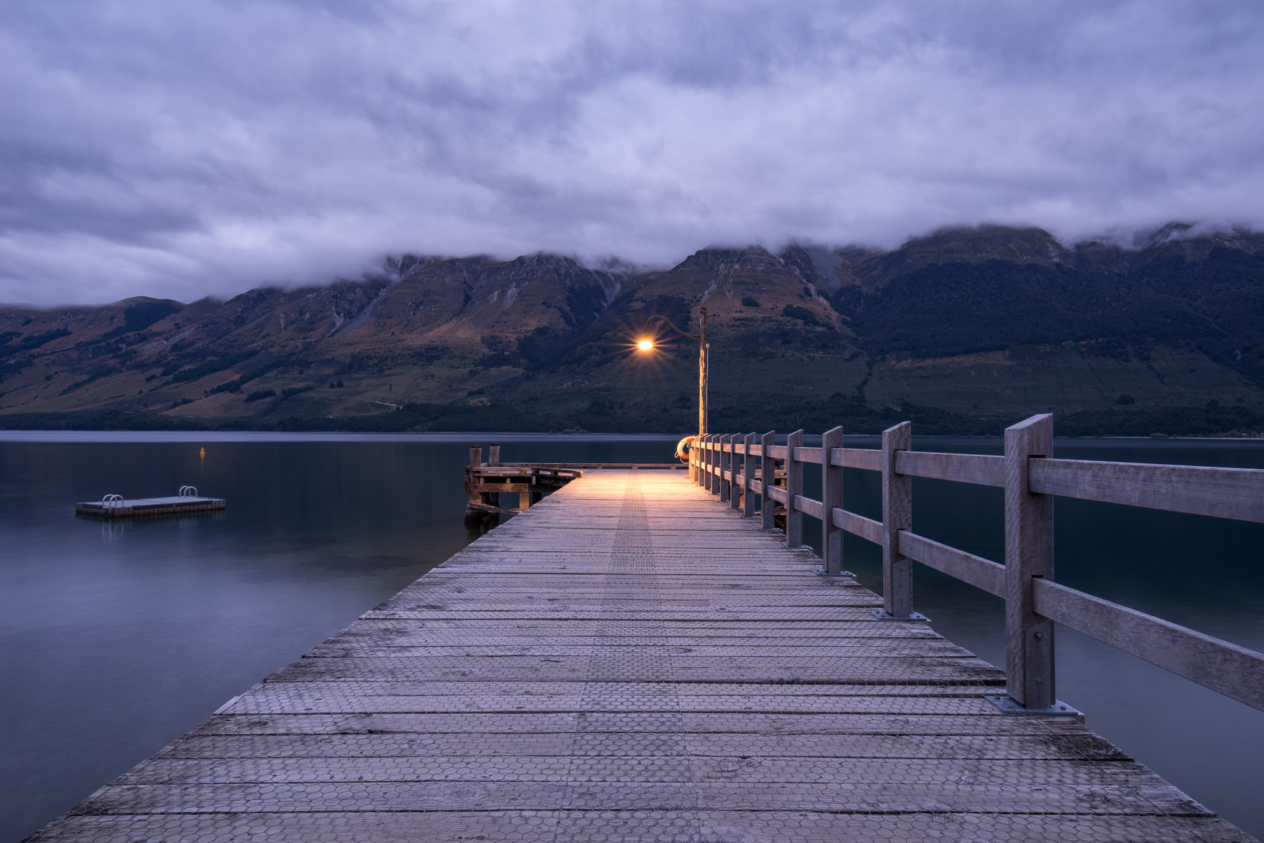 A pier at Glenorchy. Thick fog enveloped the mountains this morning.