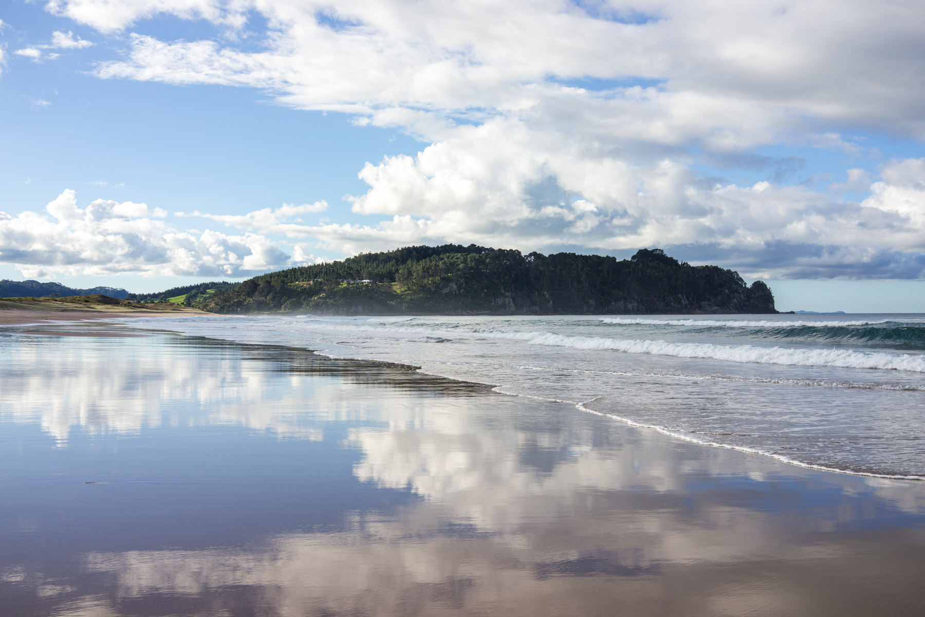 Hot Water Beach. The slow-rolling waves left quite the reflection.