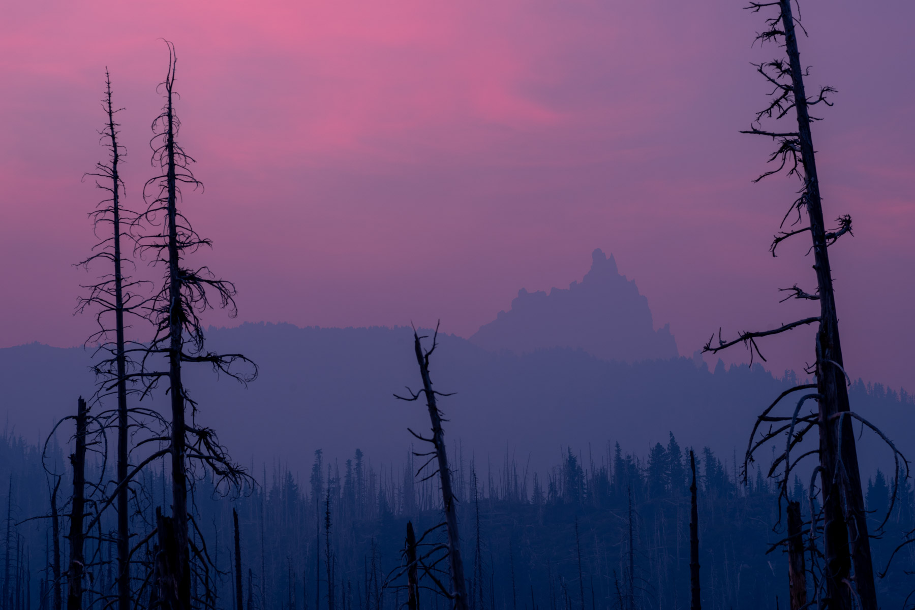 Mount Jefferson in the distance, hazy from a wildfire nearby.