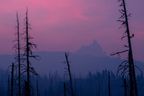 Mount Jefferson in the distance, hazy from a wildfire nearby.