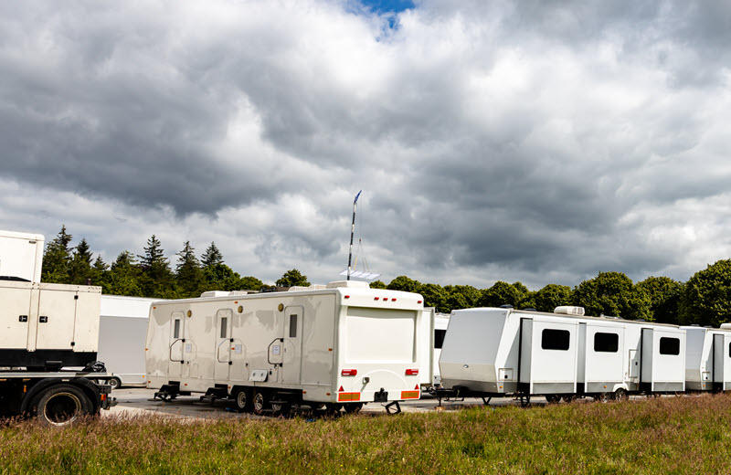 Production trailers on location for a UK film or TV shoot.